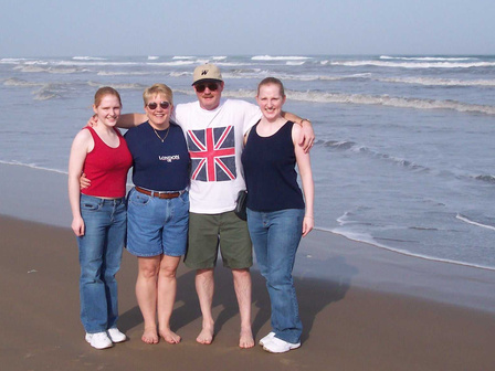 December 2004 - South Padre Island Texas: passersby thought we were tourists from the UK. Gee, what about this family photo made anyone think that? Haha! (L-R: my sister, mom, dad, me)