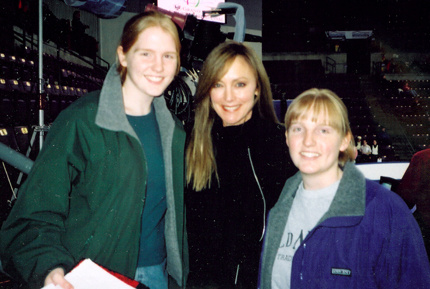 December 2003 - at the Grand Prix of Figure Skating Final in Colorado Springs, posing for a photo with Peggy Fleming (1968 Olympic Gold Medalist). I'm in the purple jacket, and look tired because we barely slept on that trip.